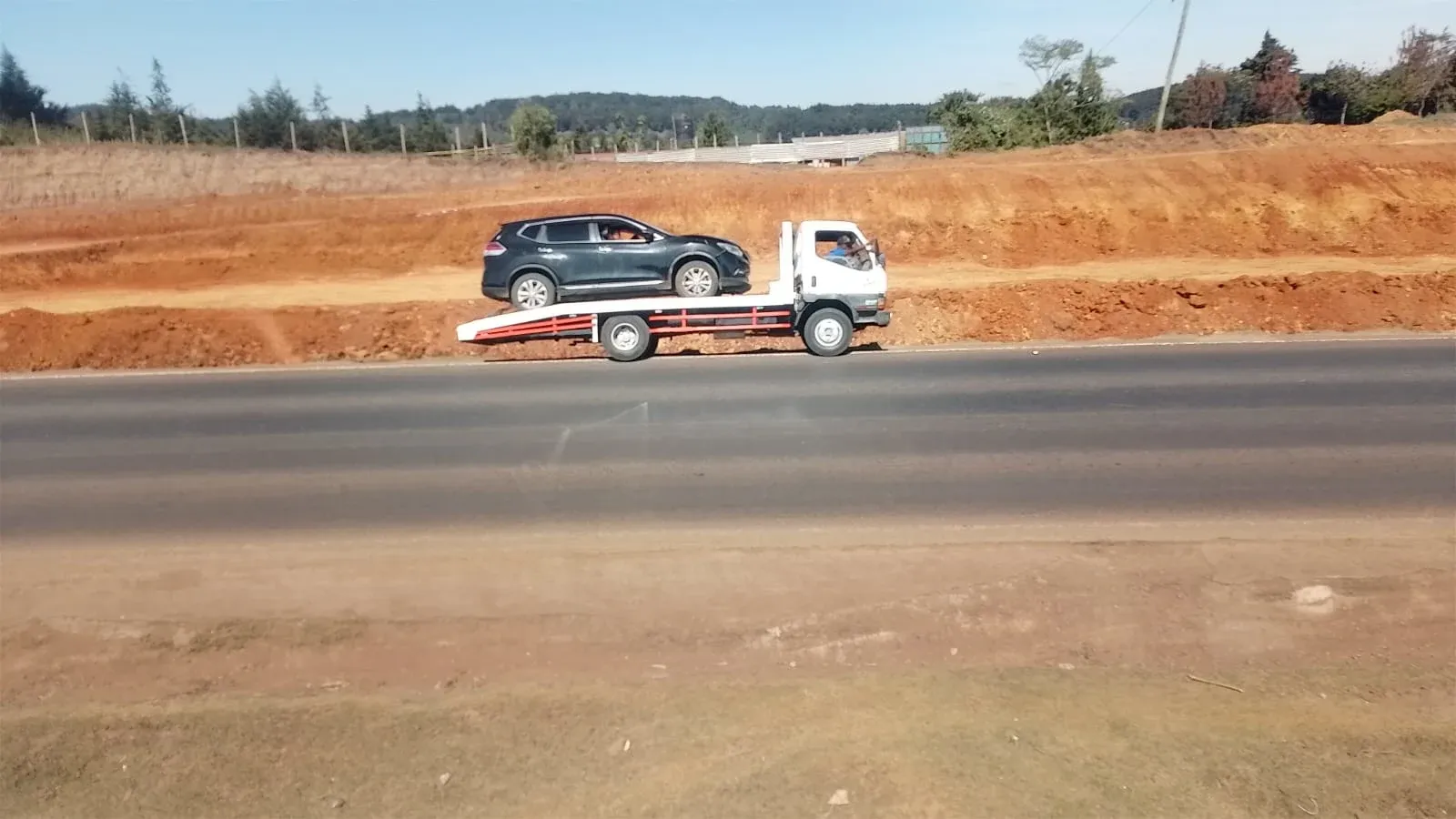 Tow truck on Thika Road at night